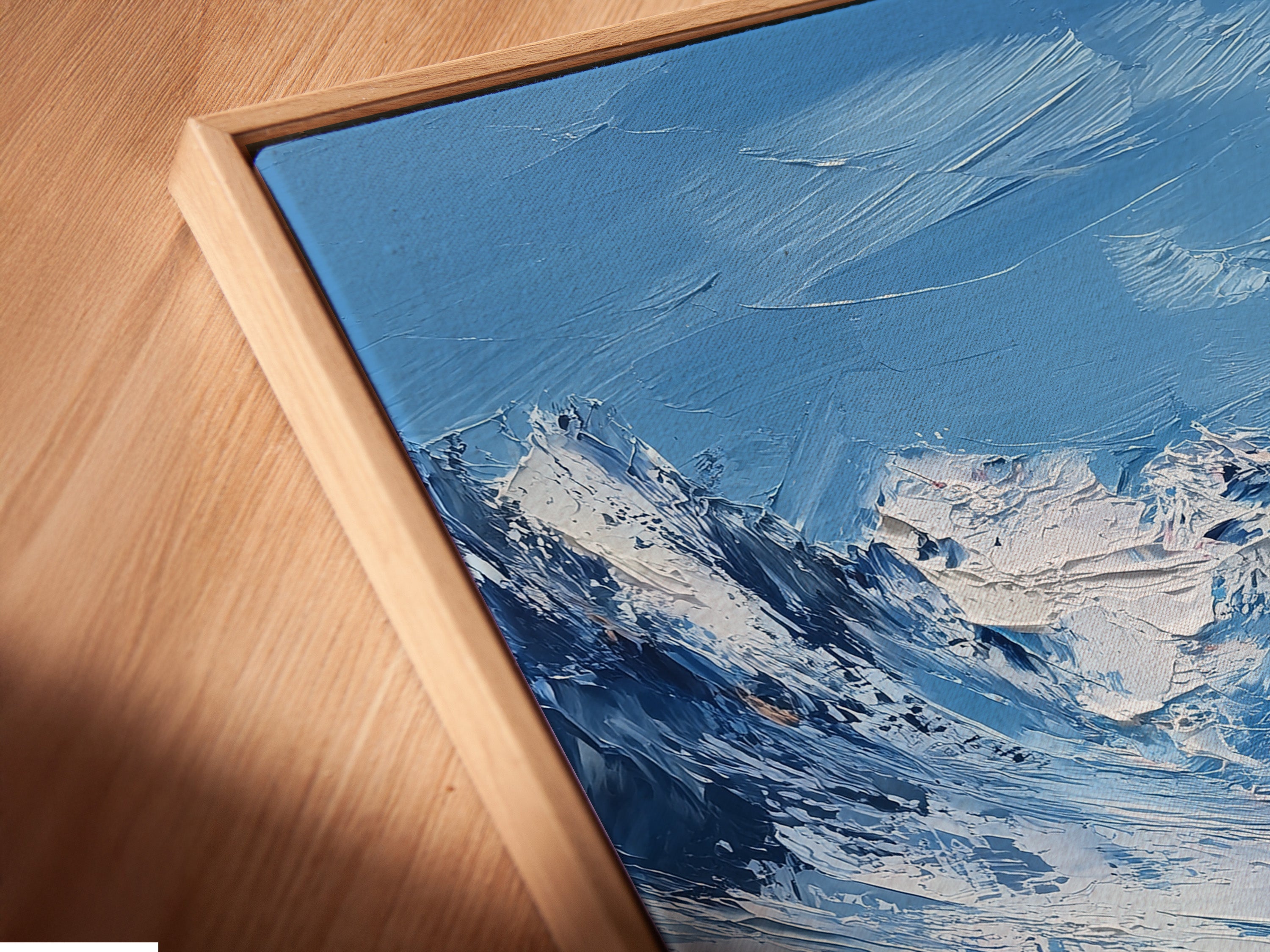 This is a close-up of a canvas print. It is showcased in a floating frame. The angled view highlights the texture and detail. The floating frame adds depth and dimension. See the artwork come to life with this unique framing style. Experience art from a new perspective.