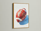 Bring a touch of luxury with this football artwork. The canvas print showcases a painted style football in a gold frame. Perfect for adding a contemporary touch to any room. This sports print is ideal for a game room or man cave. This artwork is a stylish addition for athletes and fans.