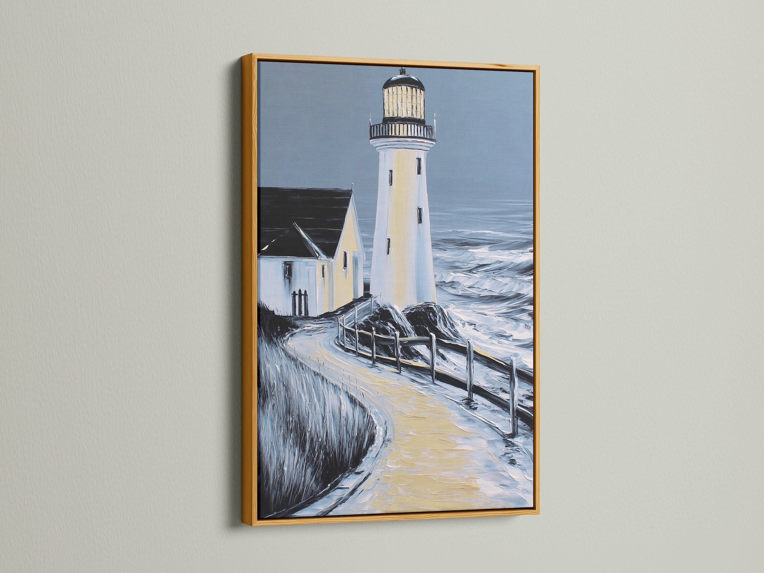 Lighthouse coastal artwork in a gold frame. This ocean view art brings a touch of elegance to your decor. The gold frame adds a luxurious feel. Perfect for those seeking elevated coastal wall art.