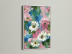 Floral canvas artwork with a white frame. This pink and blue flower wall art is perfect for bedroom wall decor. The impressionist botanical artwork offers a serene touch. Ideal for nurseries and studios. This daisy art print complements contemporary styles. Bring spring wall art into your home. Abstract flowers add a fresh aesthetic. Shabby chic art for a refined look.