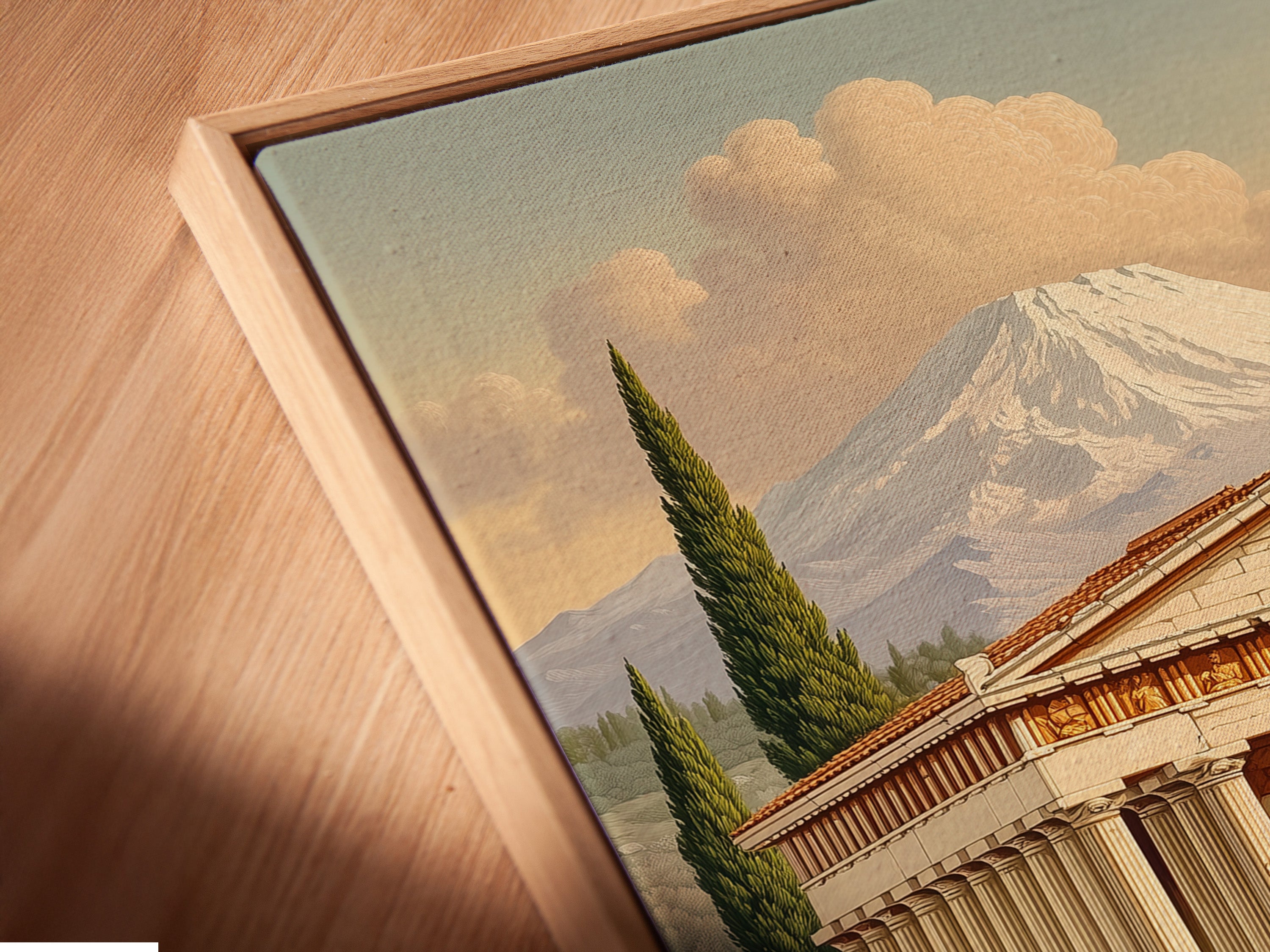 Close-up of a canvas print in a floating frame. The artwork depicts a Greek Temple. The floating frame adds a modern touch. The beige and green tones complement various decor styles. This historical artwork is ready to hang.