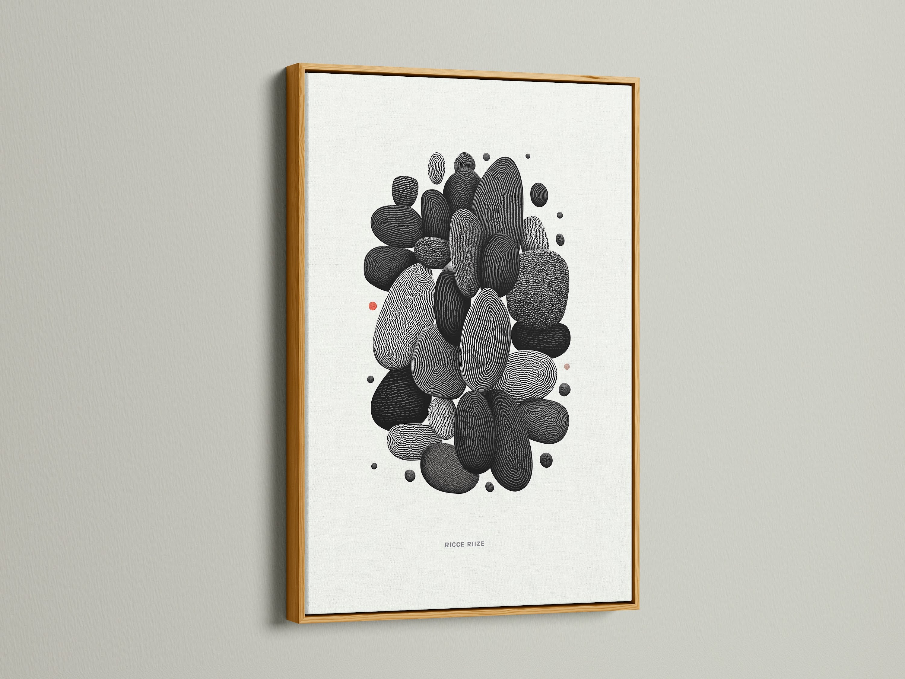 Abstract Pebble artwork in a gold frame. This minimalist black and white wall art makes a statement. The modern stone artwork enhances any room. Ideal for those who appreciate contemporary and scandi style decor in their spaces.