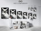 A size comparison chart is displayed in an interior setting. The chart shows various sizes of the owl artwork. Available as a stretched canvas print fine art poster or framed. The black and white wildlife art can fit any space. Perfect for minimalist and modern decor.