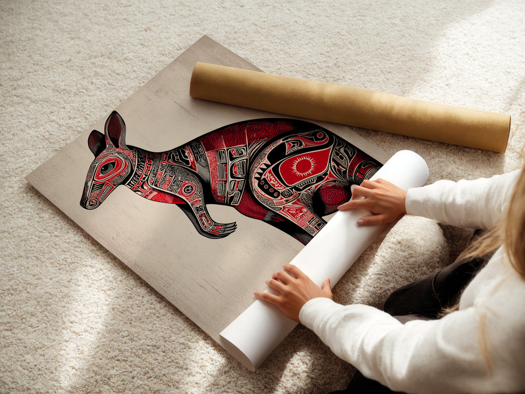 A woman carefully rolls a fine art poster paper. The paper features the Aboriginal Kangaroo artwork. The poster showcases intricate tribal animal art. The red and black details are preserved. This fine art poster is ideal for art collectors.