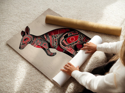 A woman carefully rolls a fine art poster paper. The paper features the Aboriginal Kangaroo artwork. The poster showcases intricate tribal animal art. The red and black details are preserved. This fine art poster is ideal for art collectors.