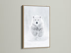 A framed polar bear artwork features an oak frame enhancing the monochrome animal photography. The oak frame complements the wildlife wall art adding a rustic touch to minimalist decor. It's ideal as bear canvas print or arctic art print.