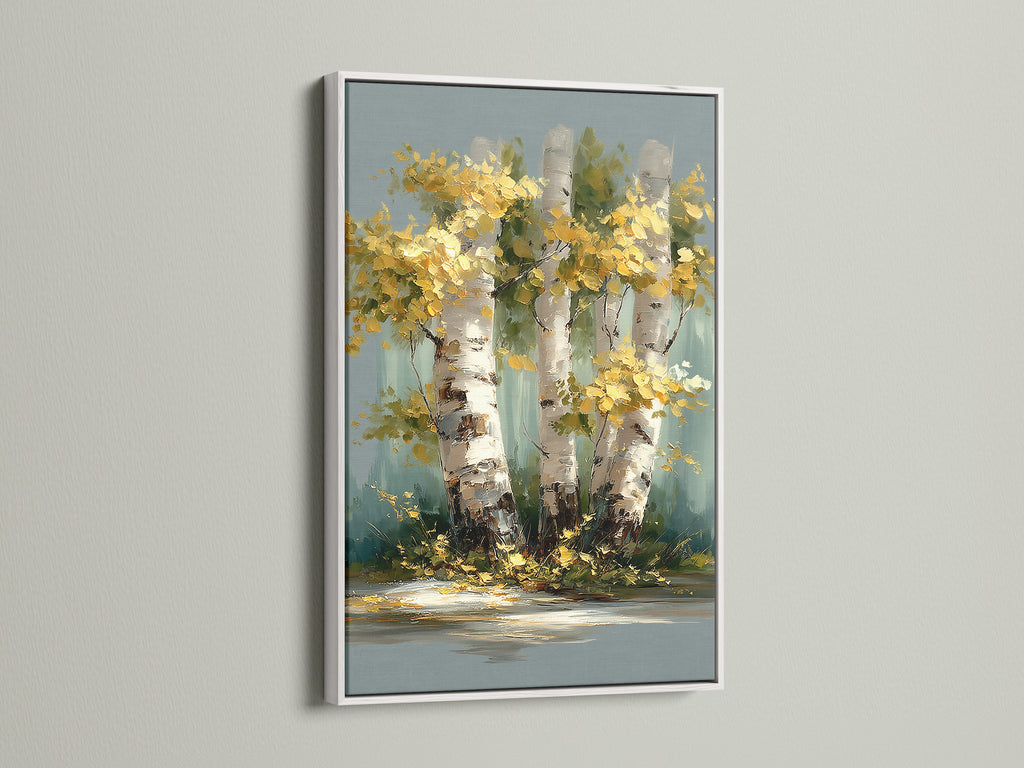 Birch Tree Canvas Print with a white frame. The white frame enhances the forest canvas. This nature artwork includes golden foliage. Perfect wall decor for rustic and primitive styles.