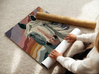 Woman rolling a fine art poster paper featuring a horse portrait. High-quality materials ensure vibrant colors and lasting beauty. Perfect for creating custom wall decor. A great way to personalize your space with unique equestrian artwork. Perfect for the home.