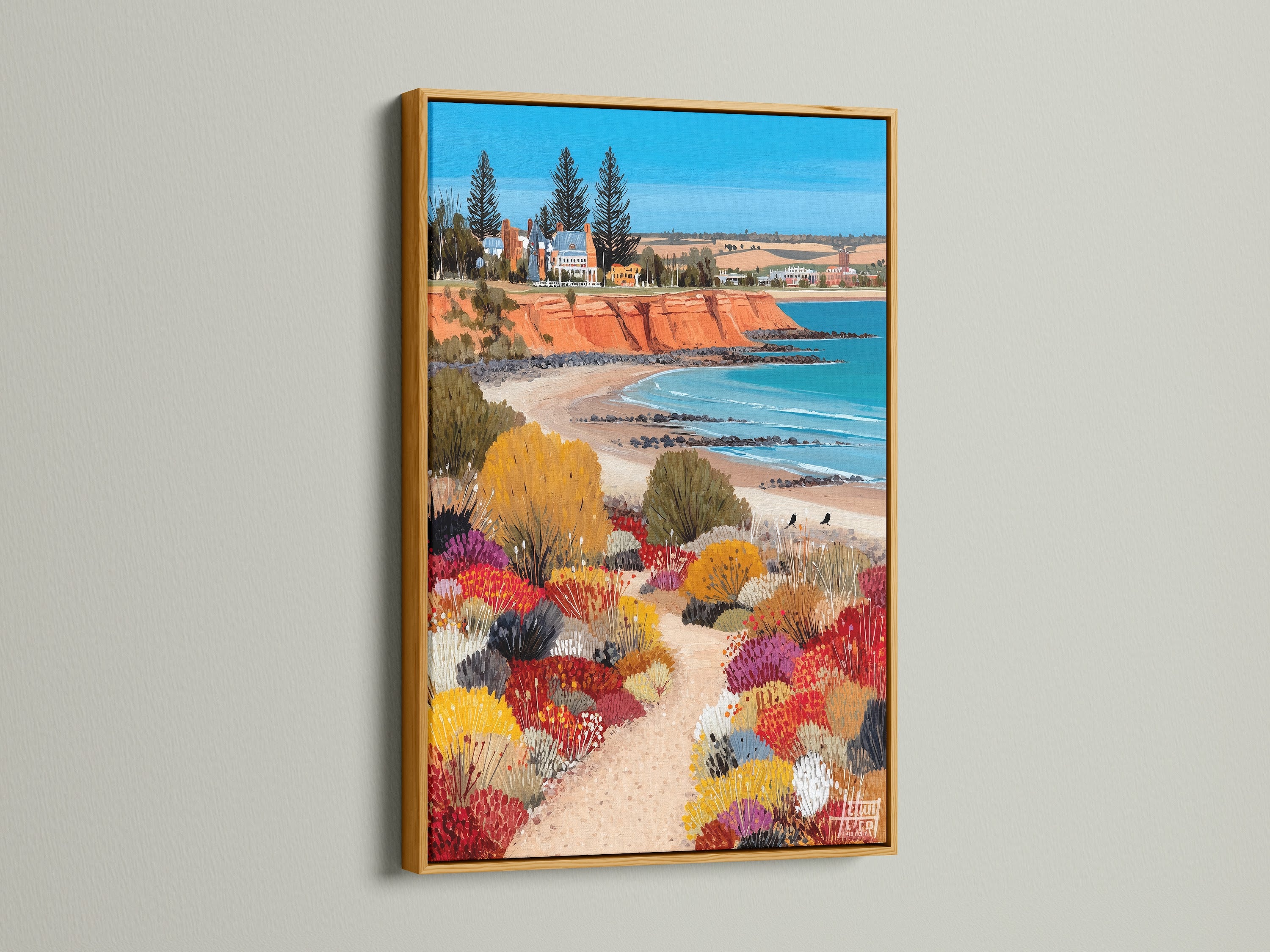 A vibrant coastal landscape artwork is elegantly framed in gold. This seascape art captures the essence of the Australian coast. The gold frame adds a touch of luxury to this colorful artwork. It is perfect for living rooms bedrooms or offices. Enhance your space with this exquisite piece. Order now.