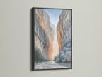 Transform your office with this river landscape artwork in a black frame. The earthy wall art creates a sophisticated ambiance. This gorge art print suits studios and boardrooms. A great choice for contemporary wall decor.