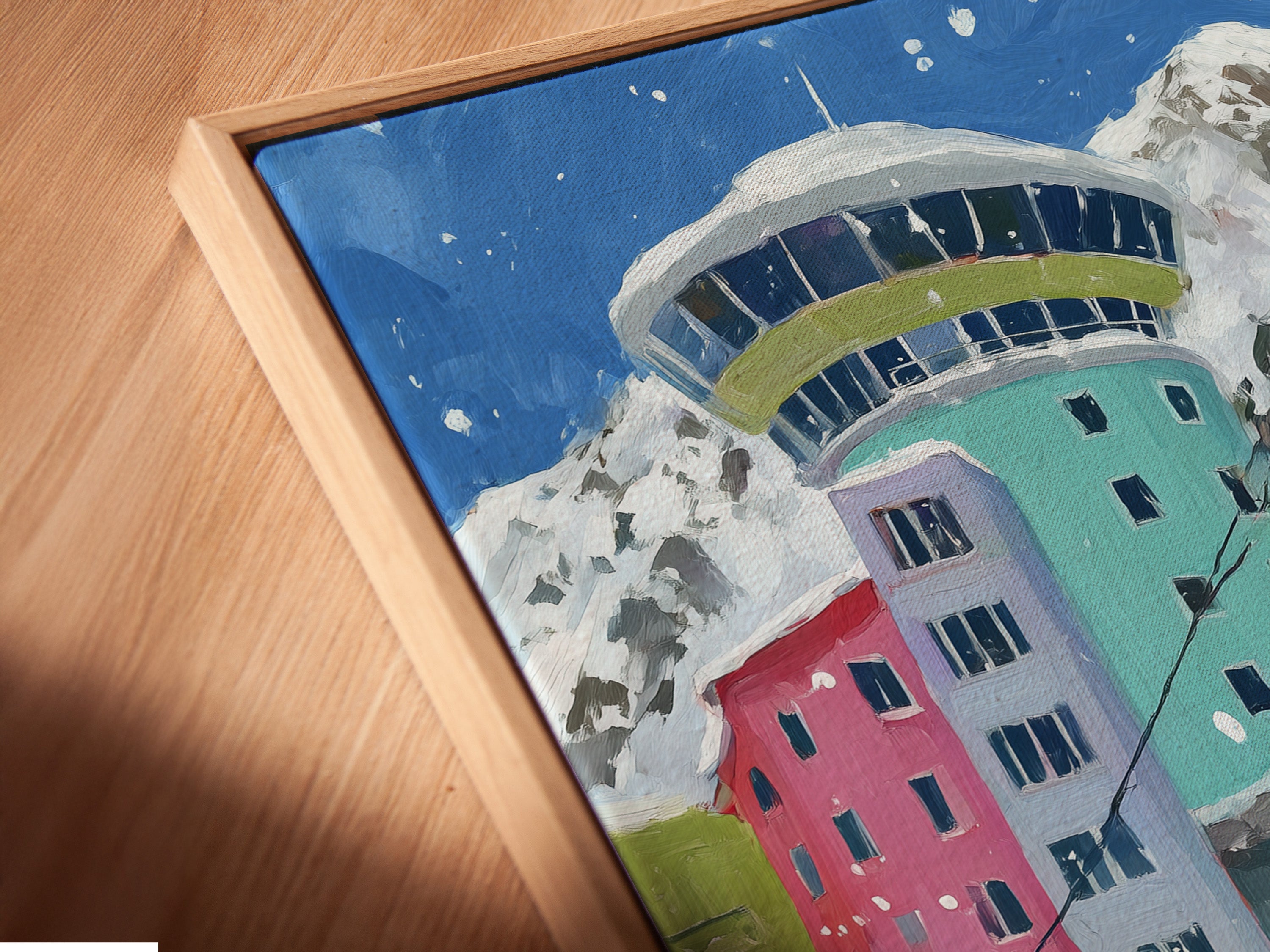 A close-up of a canvas print in a floating frame. The alpine cable car artwork looks stunning in this modern frame style. Perfect for showcasing your mountain village art. The floating frame adds depth and sophistication.