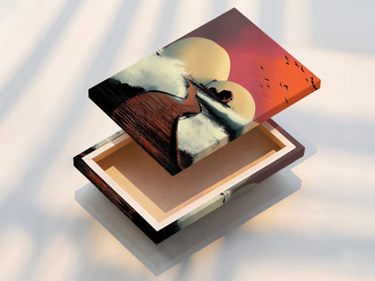 A stretched canvas print displays a modern coastal artwork featuring a sunset pier scene. The house on a pier is set against an orange and pink sky. Ideal for living rooms bedrooms and offices. Enhance your space with this striking seascape print. Perfect for minimalist modern or coastal styles.