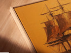 Close-up angled view of a canvas print in a floating frame. The frame enhances the artwork. It gives it a modern and sophisticated look. The canvas print is stretched. It's ready to hang and enjoy. The floating frame creates a shadow effect. It makes the artwork appear to float on the wall.