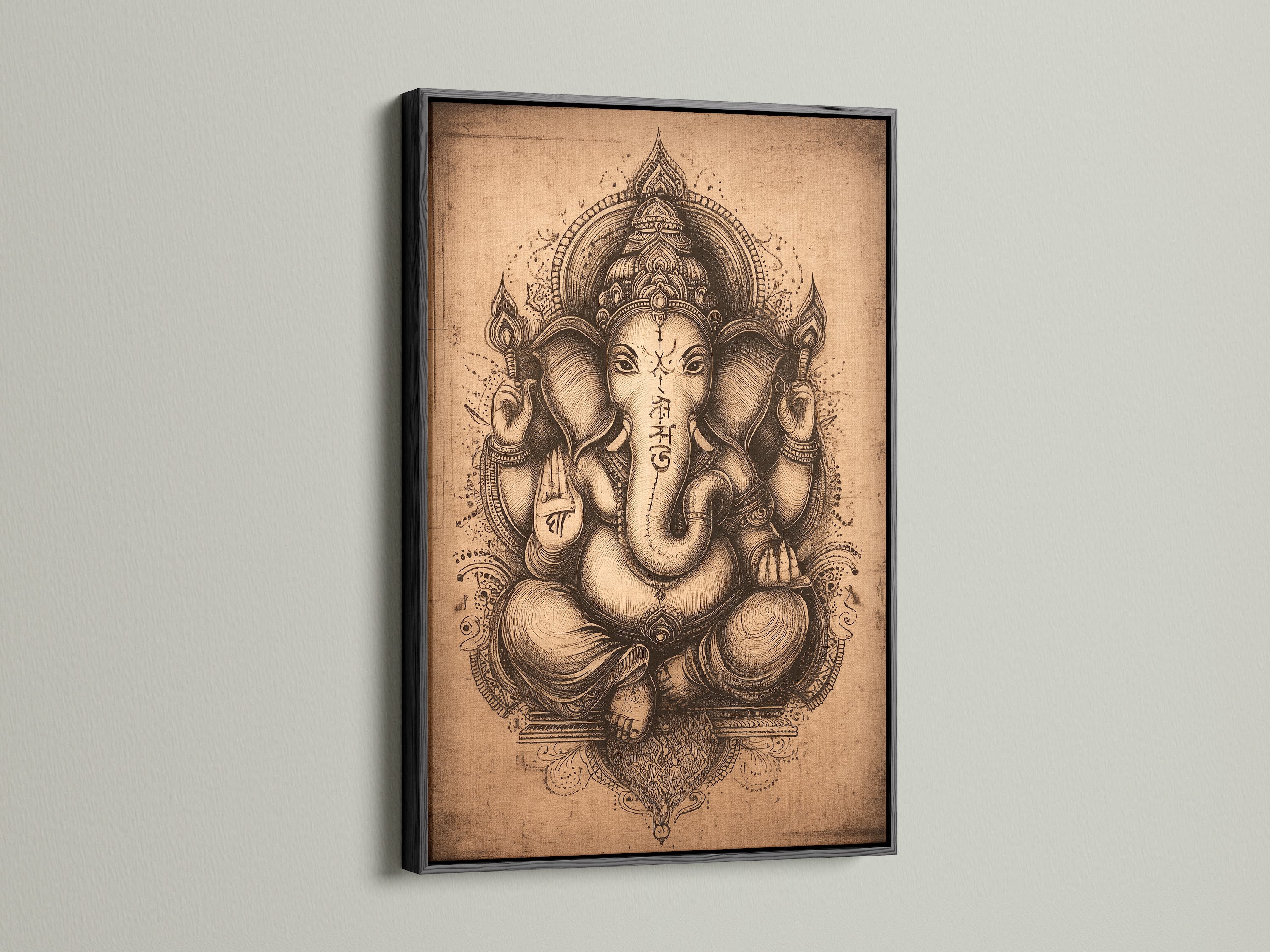 Ganesha Wall Art in a sleek black frame. This vintage Hindu canvas print of the Elephant God creates a focal point. It is perfect for spiritual wall decor in your meditation room. A sophisticated artwork.