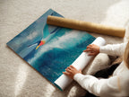 A woman is carefully rolling a fine art poster paper. The coastal bird wall art will be safely delivered. The ocean wave painting is ready to be framed. It is a high-quality print.
