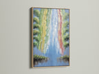 Abstract Waterfall artwork with an oak frame. This nature wall art brings colorful artwork to any room. A river print adds a touch of modern art. Ideal landscape poster for homeowners and interior decorators. Stretched canvas art.