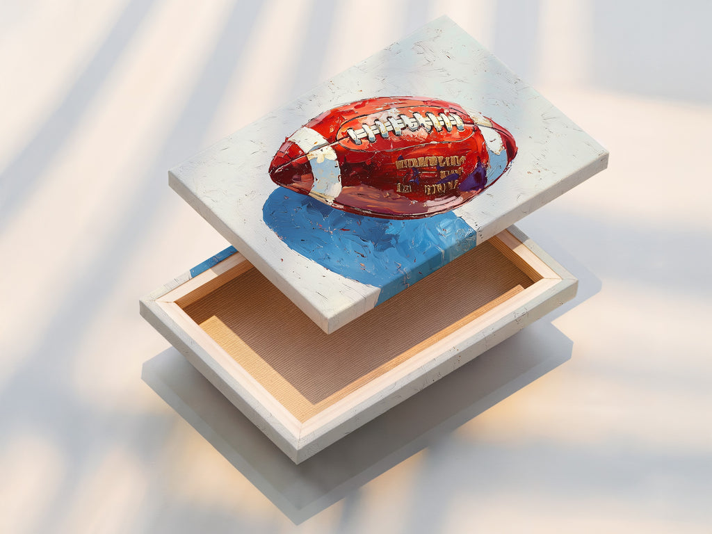 This is a stretched canvas print of a football artwork. The stretched canvas provides a gallery ready look. It is perfect for adding a contemporary touch to any space. This red and blue art is great for living rooms and bedrooms.