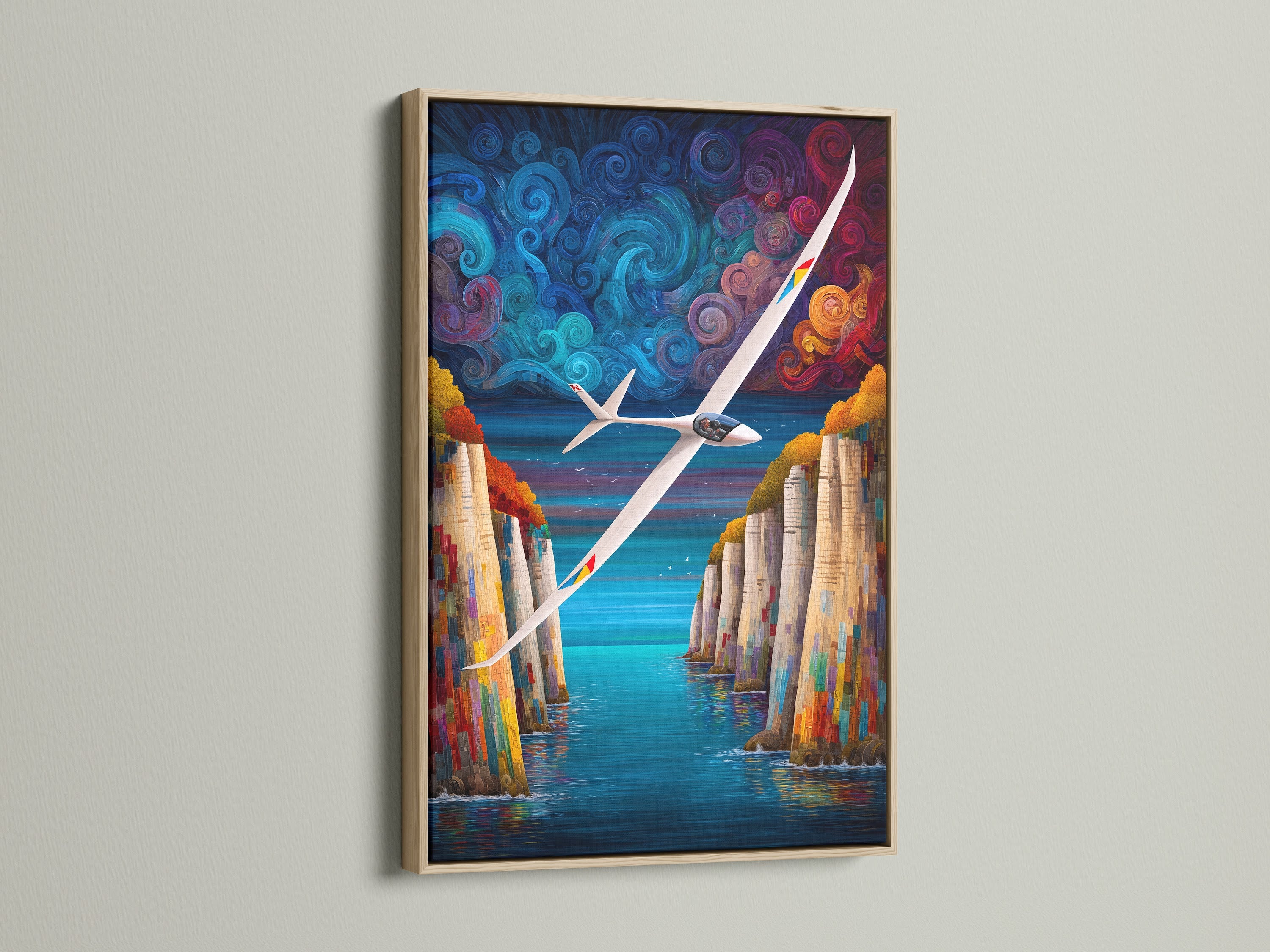 Sailplane artwork with a oak frame. This aviation print showcases a beautiful cliff landscape. The colorful art is ideal for office wall decor. It is also a thoughtful gift for aviation enthusiasts