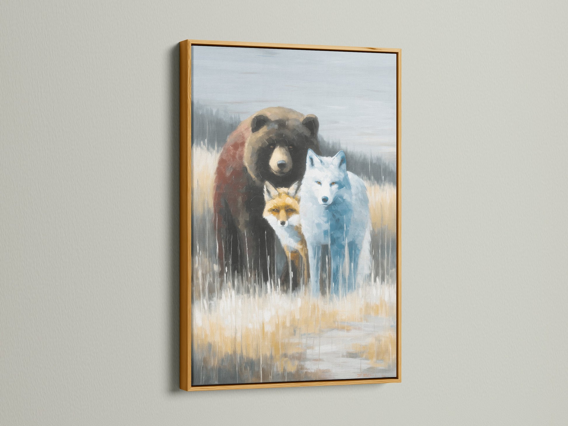 Wildlife Trio artwork in a gold frame. This animal canvas features a bear fox and wolf. Neutral tones enhance your cabin decor. Infuse rustic charm with unique animal-themed wall art. This is a perfect gift for animal lovers.