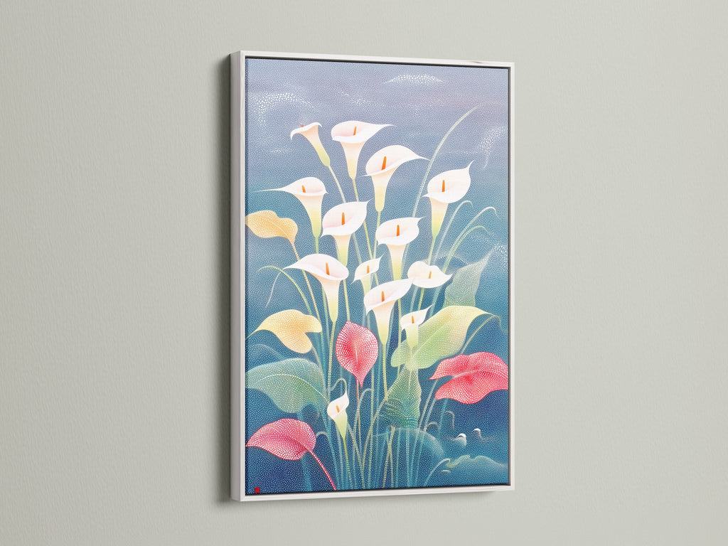 This Calla Lily floral canvas is displayed in a white frame. This botanical flower artwork enhances a bedroom. Modern spring home decor is a plus. Great for interior designers seeking botanical wall decor.