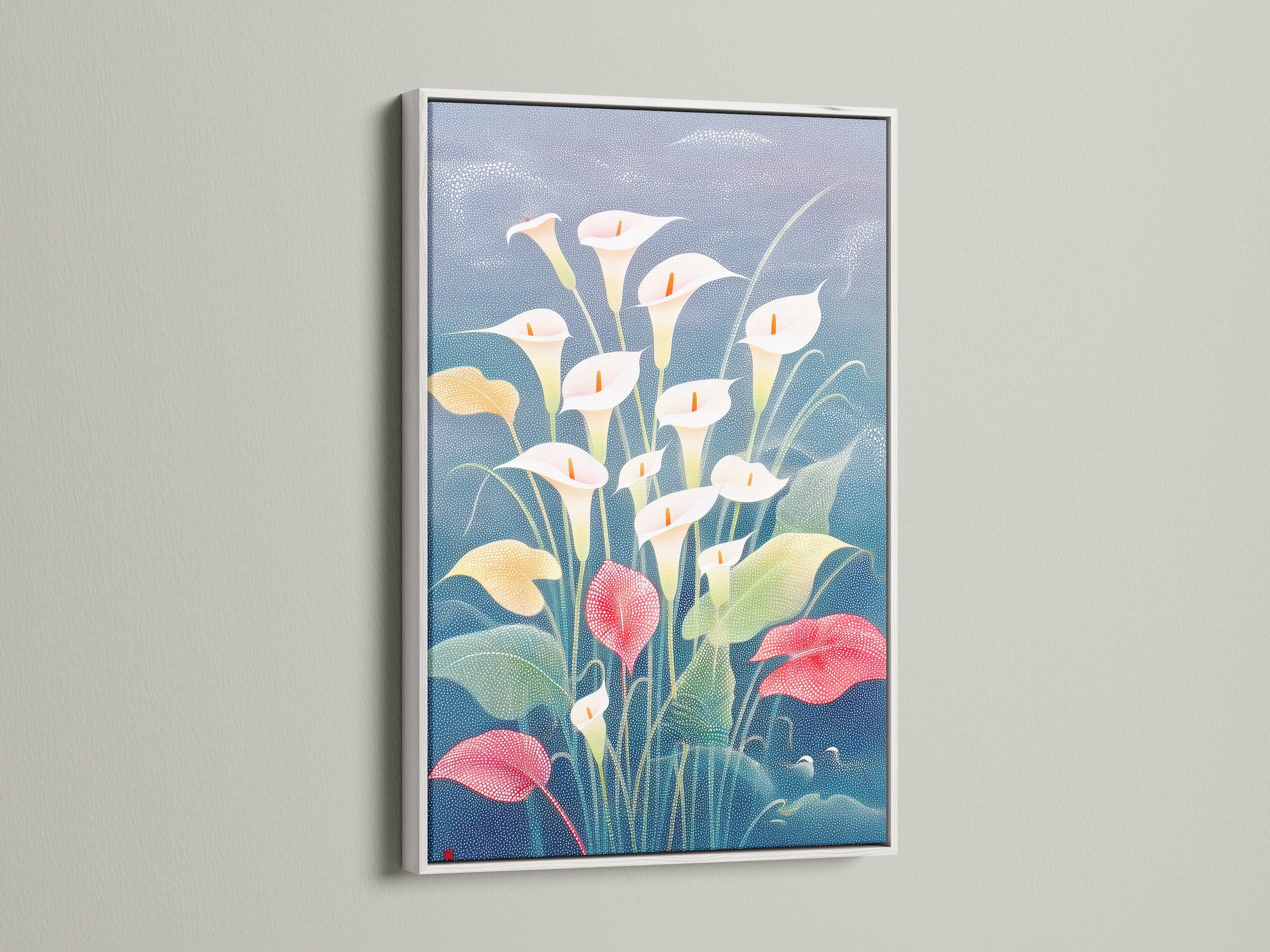 This Calla Lily floral canvas is displayed in a white frame. This botanical flower artwork enhances a bedroom. Modern spring home decor is a plus. Great for interior designers seeking botanical wall decor.