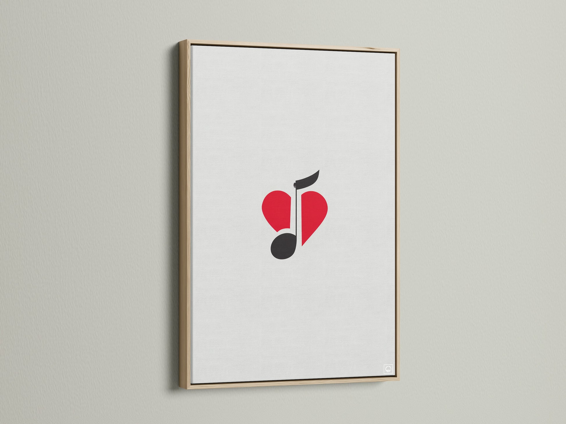 This music-themed artwork features a red heart and black music note. The artwork is framed in oak. It's ideal for a music lover gift.  Enhance your studio wall decor with this minimalist piece.