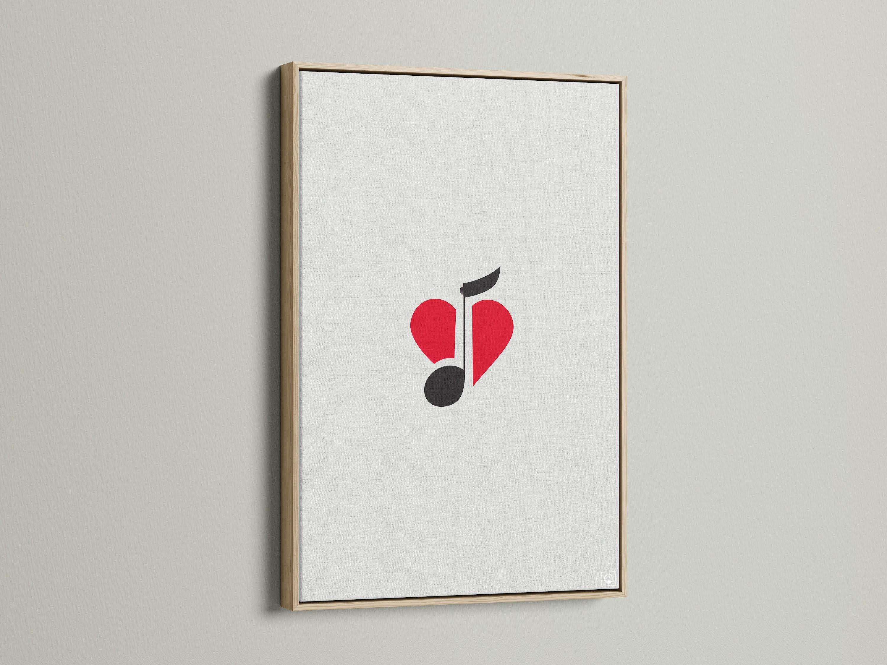 This music-themed artwork features a red heart and black music note. The artwork is framed in oak. It's ideal for a music lover gift.  Enhance your studio wall decor with this minimalist piece.