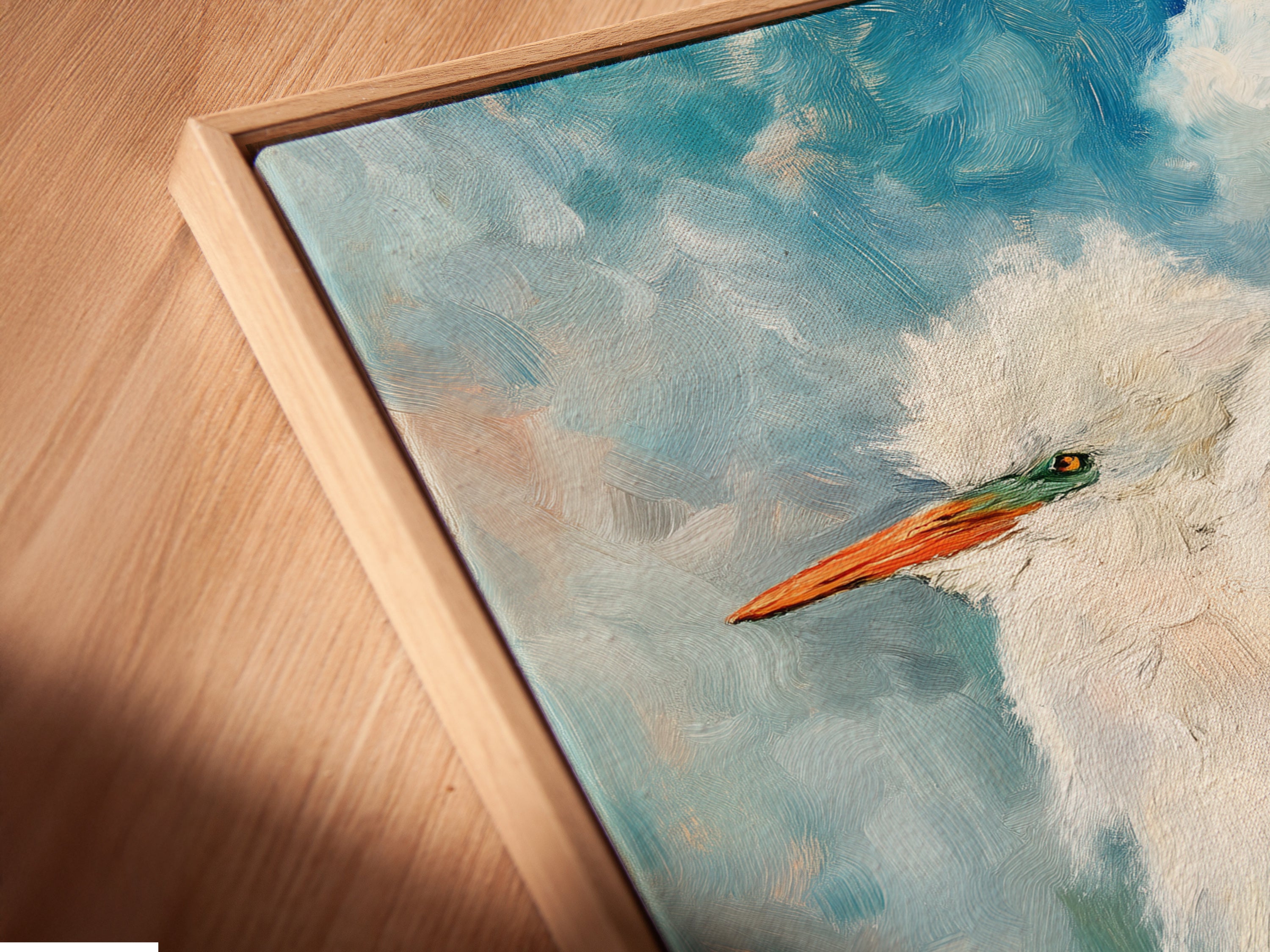 A close-up shows a canvas print in a floating frame. The Heron artwork gains depth. This style offers a contemporary look. Ideal for any room needing nature artwork