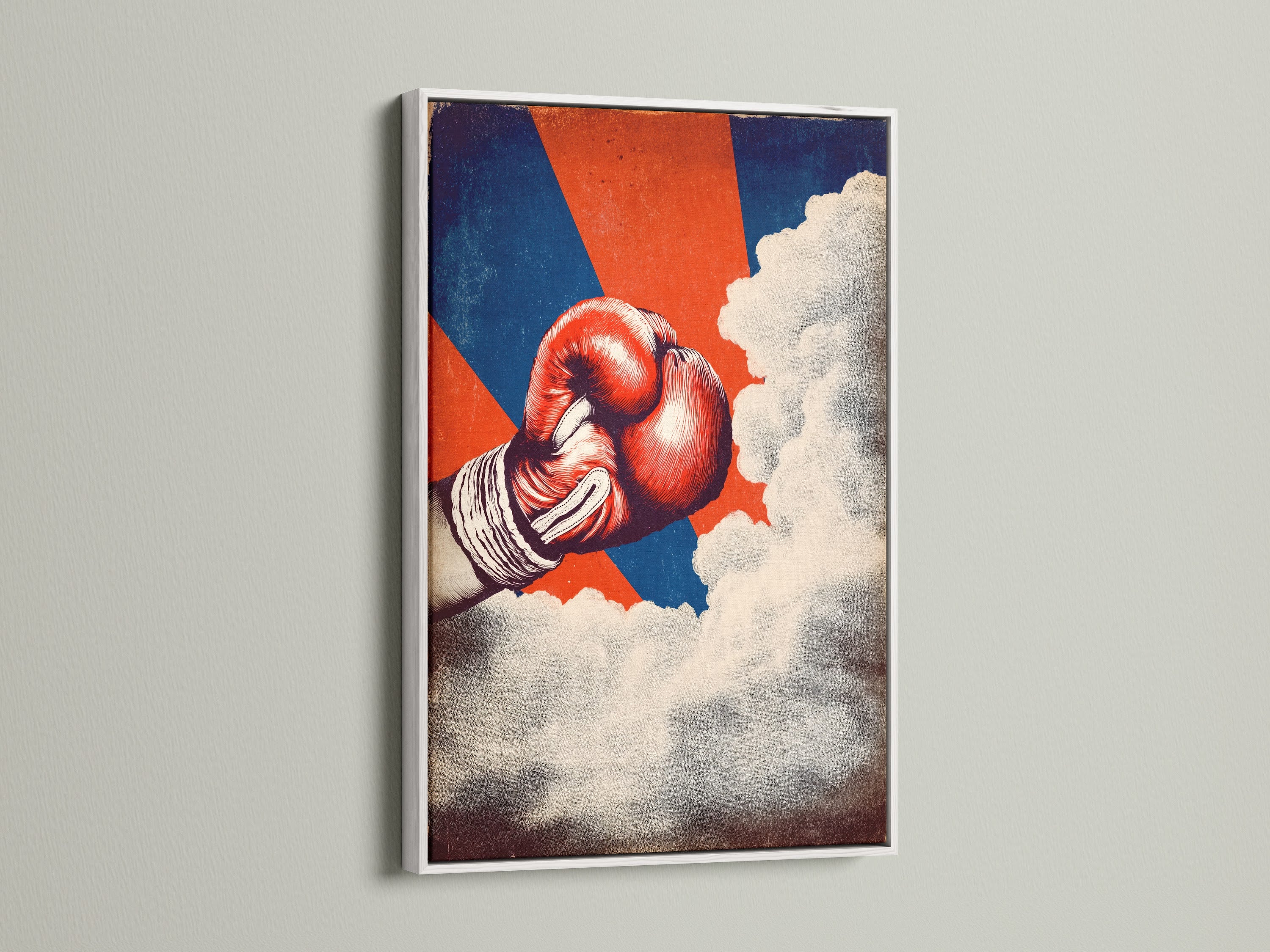 A vintage boxing glove artwork is showcased in a white frame. Enhance your man cave decor with this retro fight poster. This sports wall art adds a vintage touch to any room. The red and blue art evokes classic boxing nostalgia.
