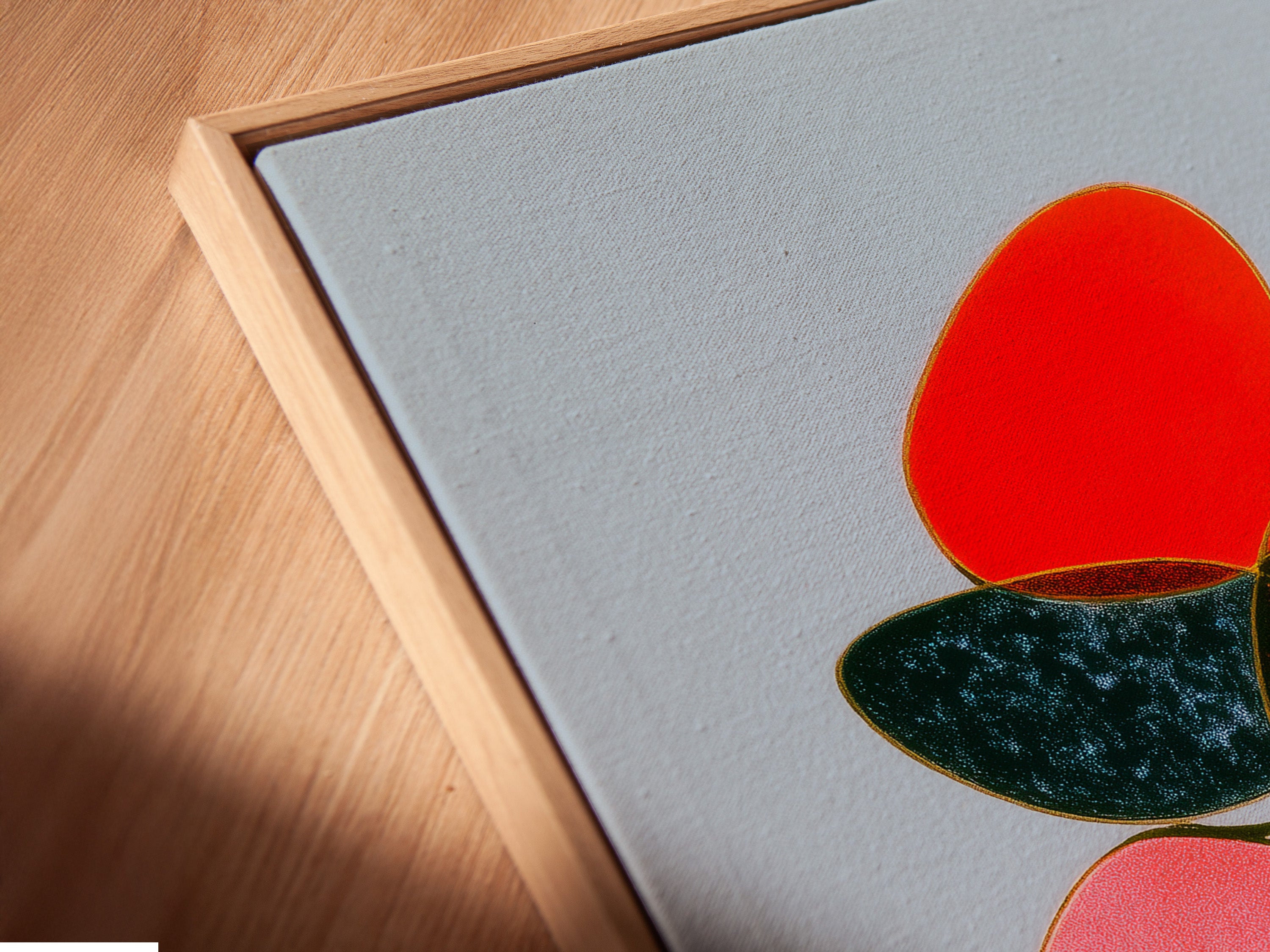 A close-up of the canvas print in a floating frame. The floating frame gives the abstract artwork a modern look. This geometric wall art is ready to hang. Perfect for contemporary art lovers.