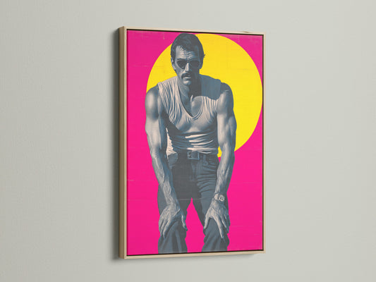 Retro wall art featuring a pop art portrait canvas print. This artwork is displayed in an oak frame. The magenta pink art and vintage poster create a cool man cave decor. Perfect for adding an 80s style to your bedroom wall.