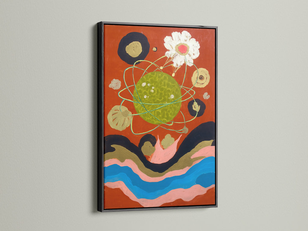 The cosmic abstract art print is displayed in a black frame. This celestial canvas art is a modern surreal canvas. This abstract collage would be great as studio decor. It would also be great as hallway art.