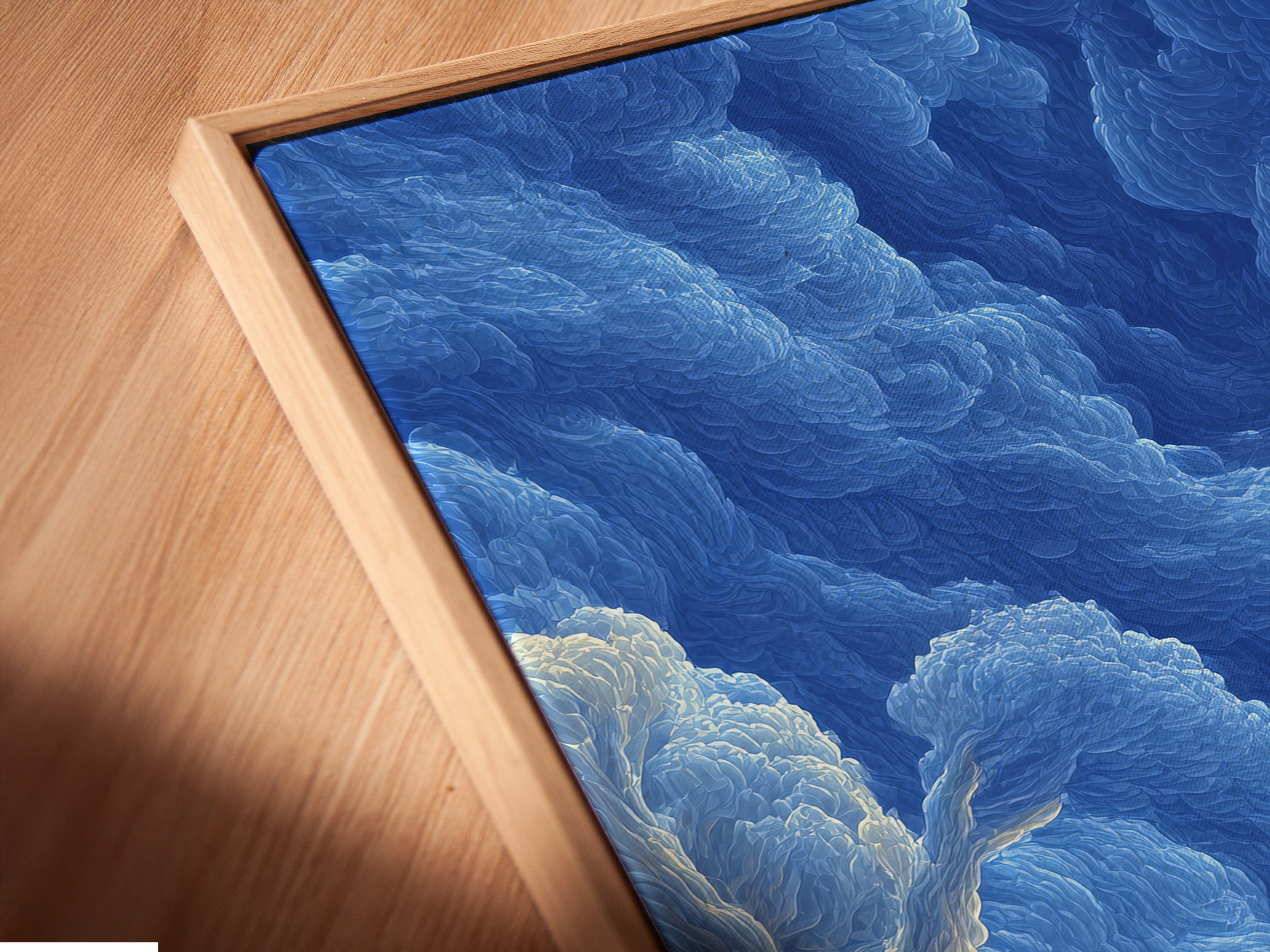 Close-up angled view of canvas print in a floating frame. The blue winter mountain artwork appears to float. Enhances the depth and texture. A modern way to display vintage ski lift posters. Perfect for adding a unique touch to any space. Explore the beauty of framed art.