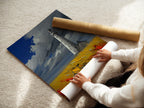 Woman rolling a fine art poster paper of a lighthouse. This fine art poster paper is perfect for creating your own custom artwork. The woman is carefully rolling the paper to avoid creases. The lighthouse image is crisp and clear. This is a great option for DIY art enthusiasts. Get creative with this versatile product.