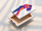 A stretched canvas print of the Passionate Embrace artwork. The stretched canvas provides a gallery-ready look. This modern art print is perfect for any space. The couple art is ready to hang and enjoy in your home. 