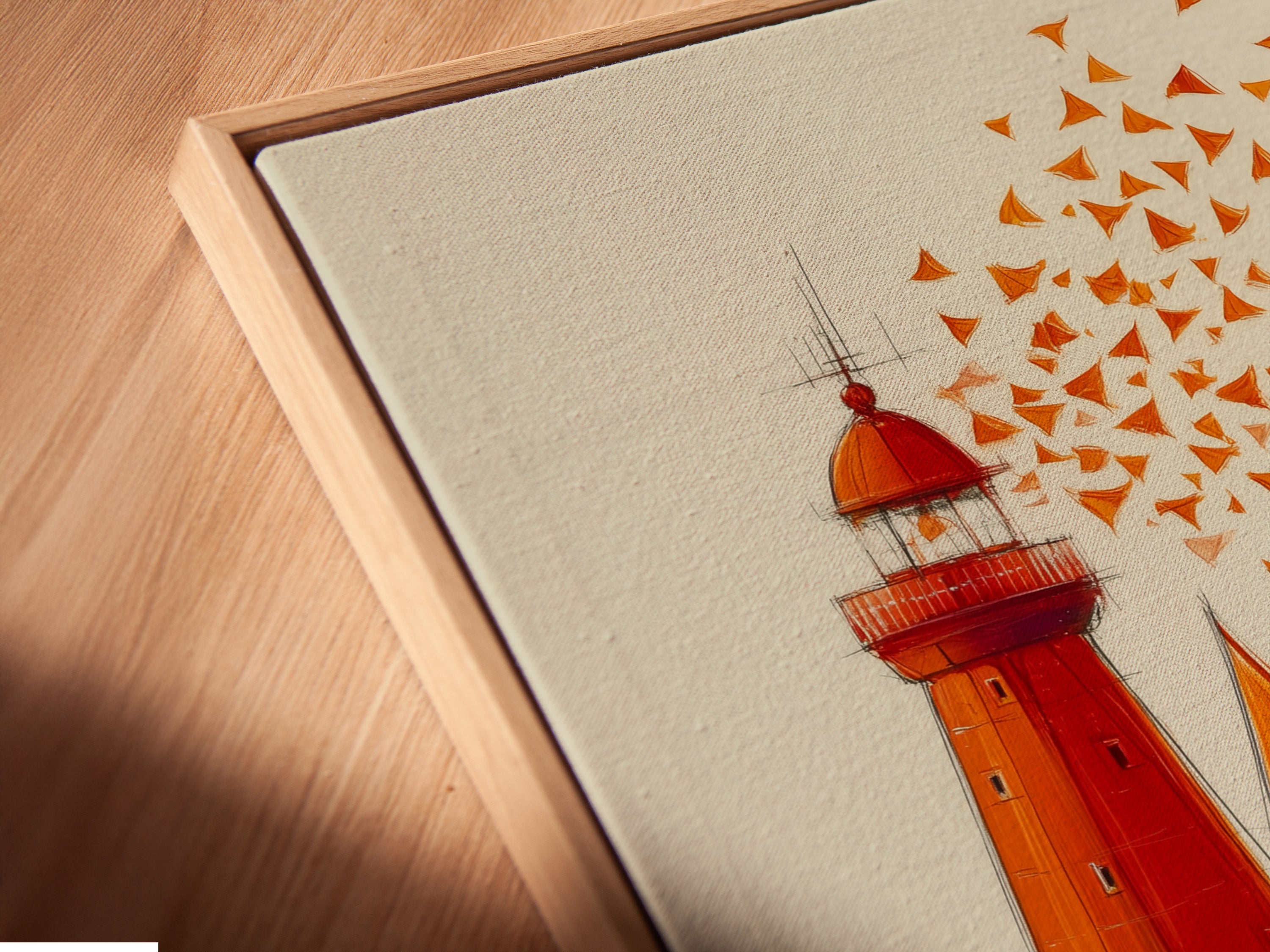 Close-up angled view of a canvas print in a floating frame. The coastal artwork features a lighthouse and sailboats. This modern framing style adds depth and dimension. Enhance your wall decor with this unique piece. Perfect for contemporary interiors.