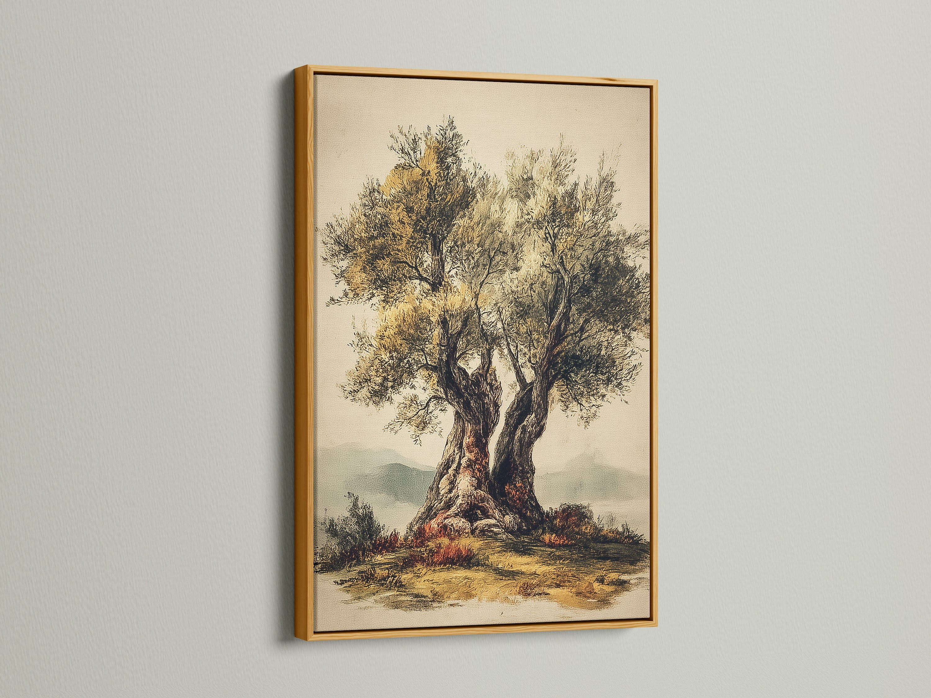 A gold frame featuring tree artwork hangs on a white wall. The gold frame adds a touch of elegance. The artwork is beautifully presented. This frame is luxurious and eye-catching.