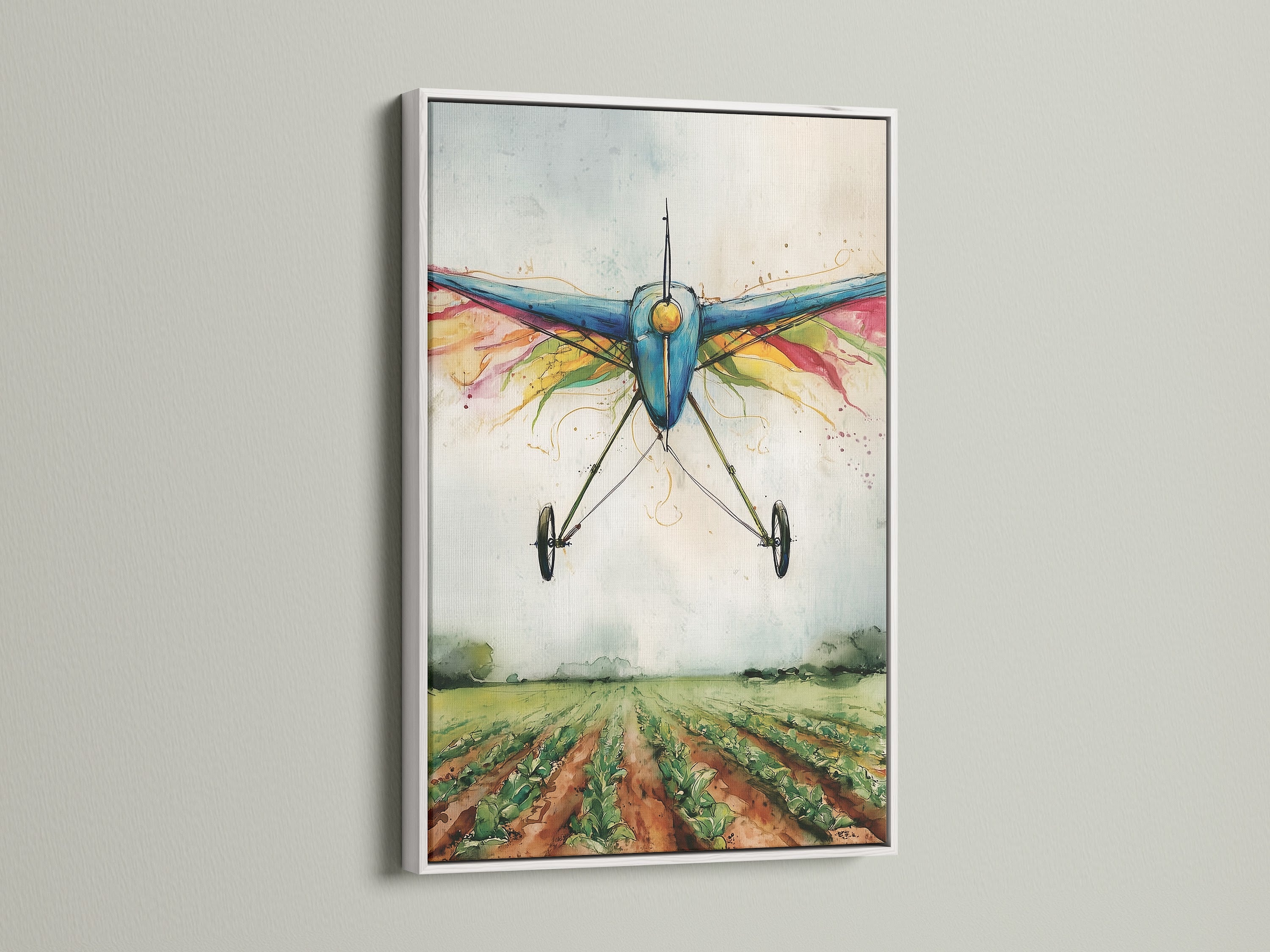 A white frame highlights a watercolor airplane artwork print. This vintage biplane art brings a fresh look. The artwork features the plane over a green field. A perfect piece for modern or farmhouse-style interiors.