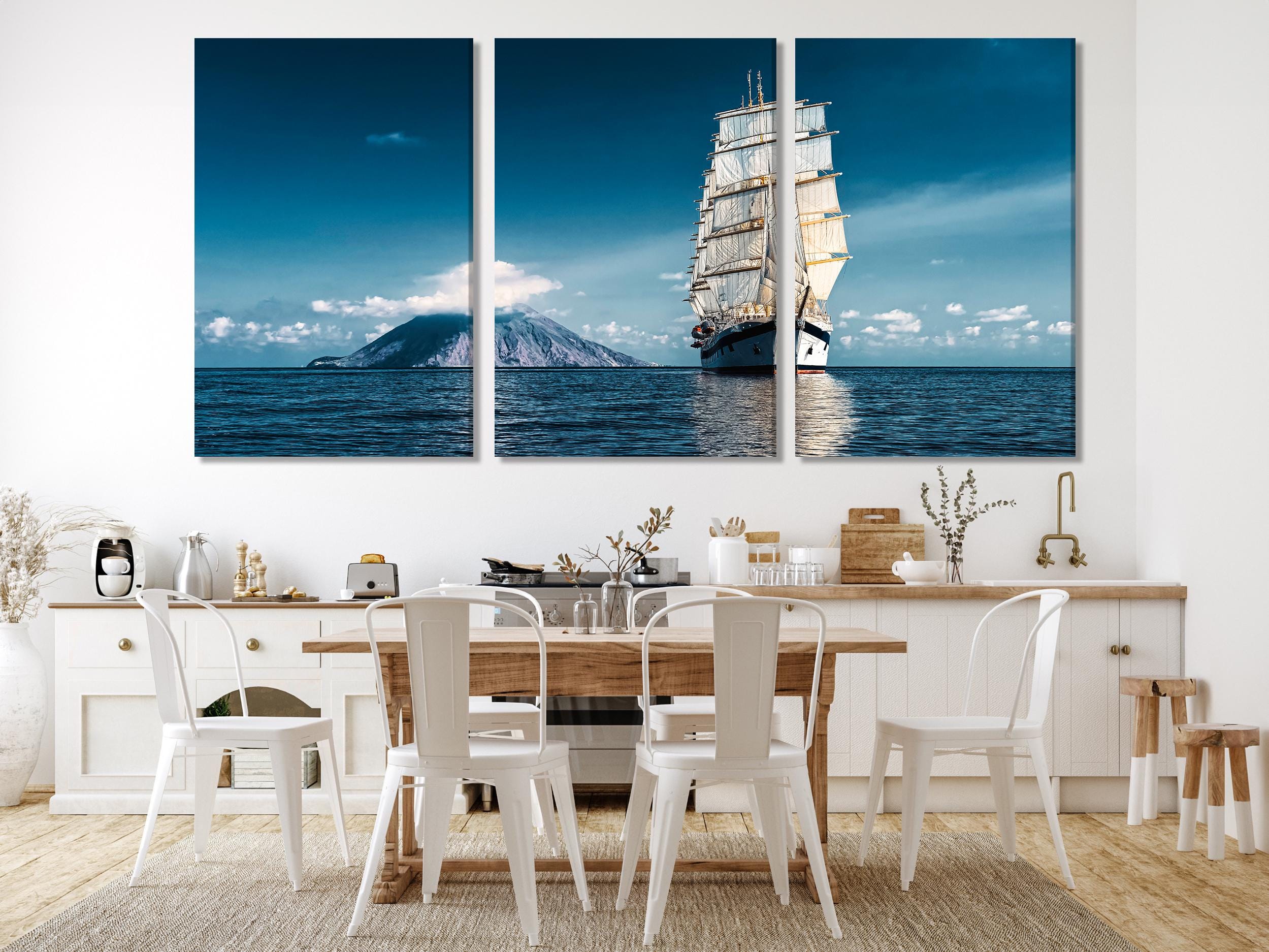 Striking seascape canvas print capturing a classic sailboat gliding across tranquil waters, delivering a refined coastal painting that enriches modern wall art collections.