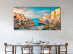 Vibrant coastal town wall art highlighting towering cliffs, pastel skies, and crystal-blue waters, ideal as a Mediterranean-inspired canvas print painting and captivating artwork.