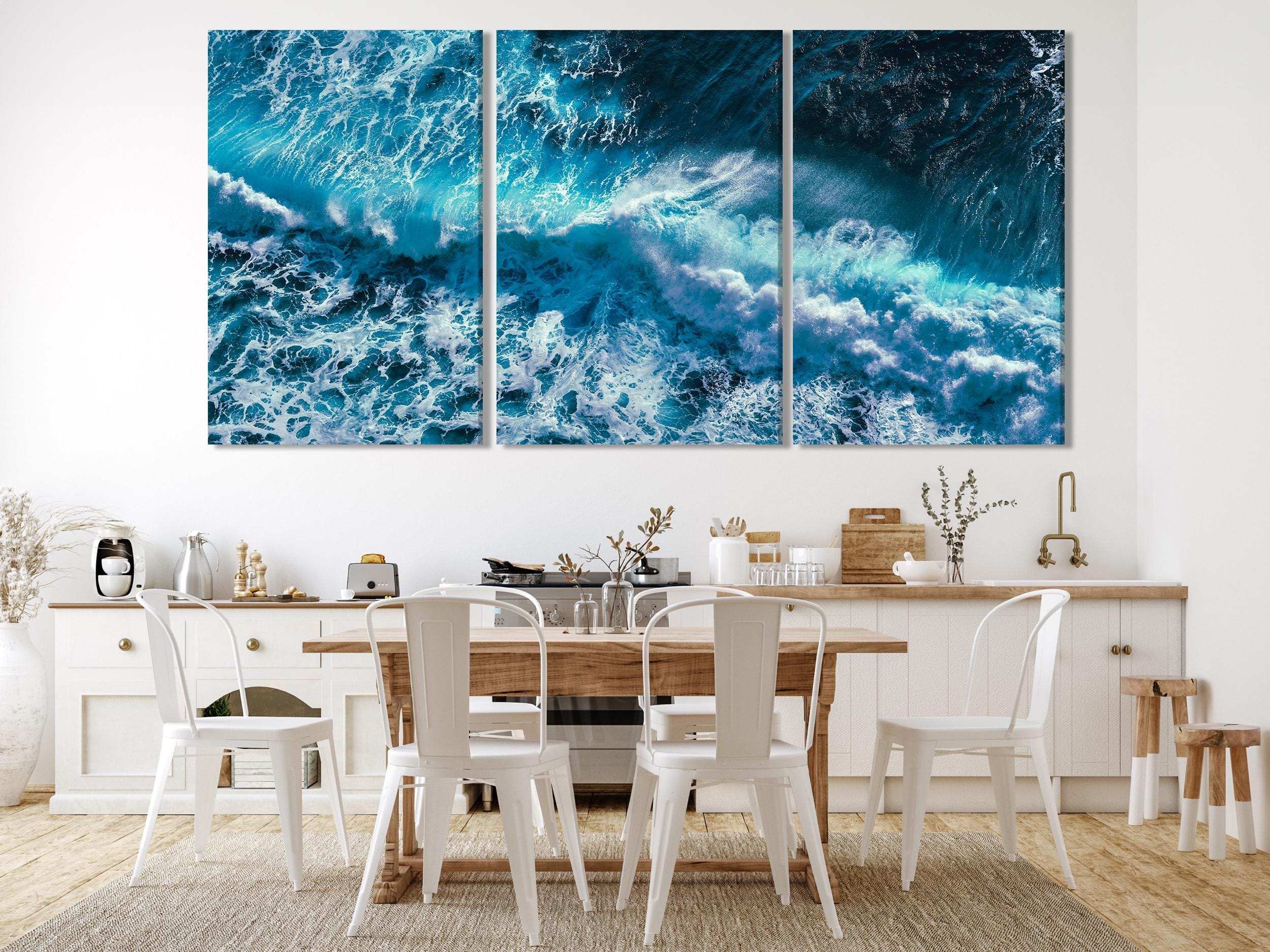 Dynamic seascape canvas print highlighting the power of crashing waves in vivid blue hues, offering a striking painting option for those seeking bold ocean-themed artwork.