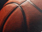 Close up view of a textured canvas print of a basketball
