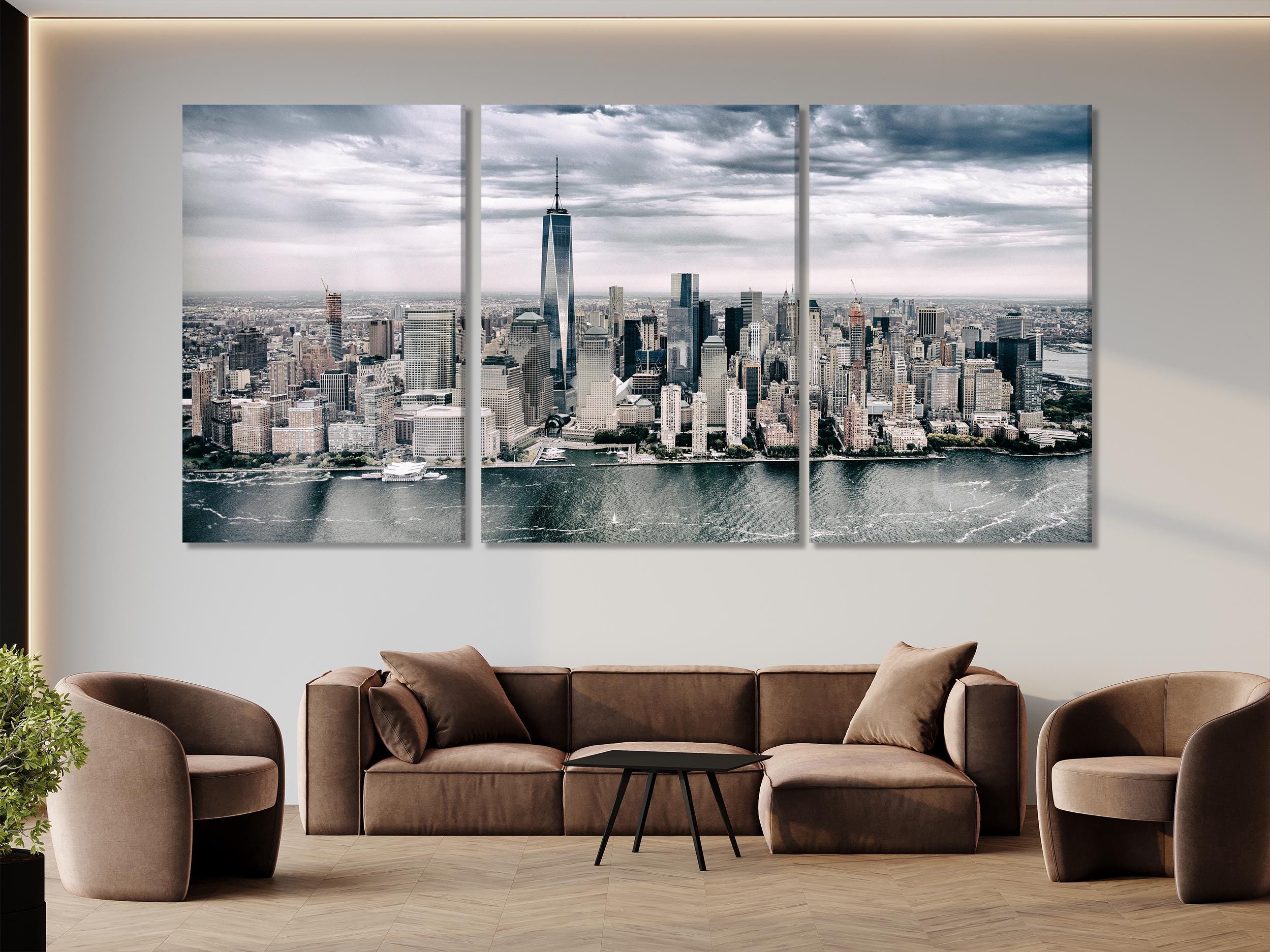 Contemporary skyline canvas print capturing towering skyscrapers beneath dramatic clouds, creating a statement artwork for refined interior design.