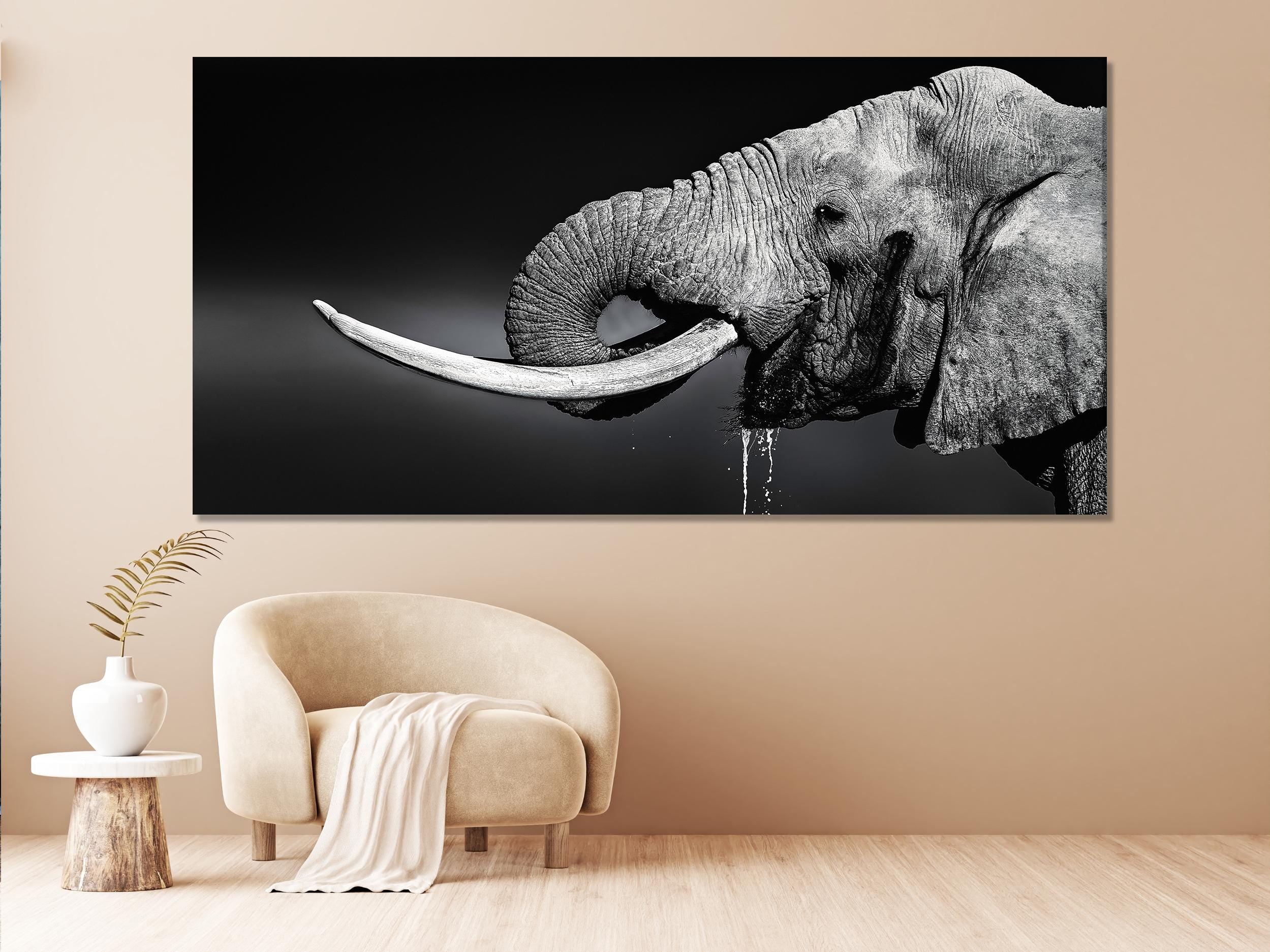 Elegant wildlife artwork highlighting an African elephant in striking grayscale, capturing its powerful presence through detailed shading and texture.