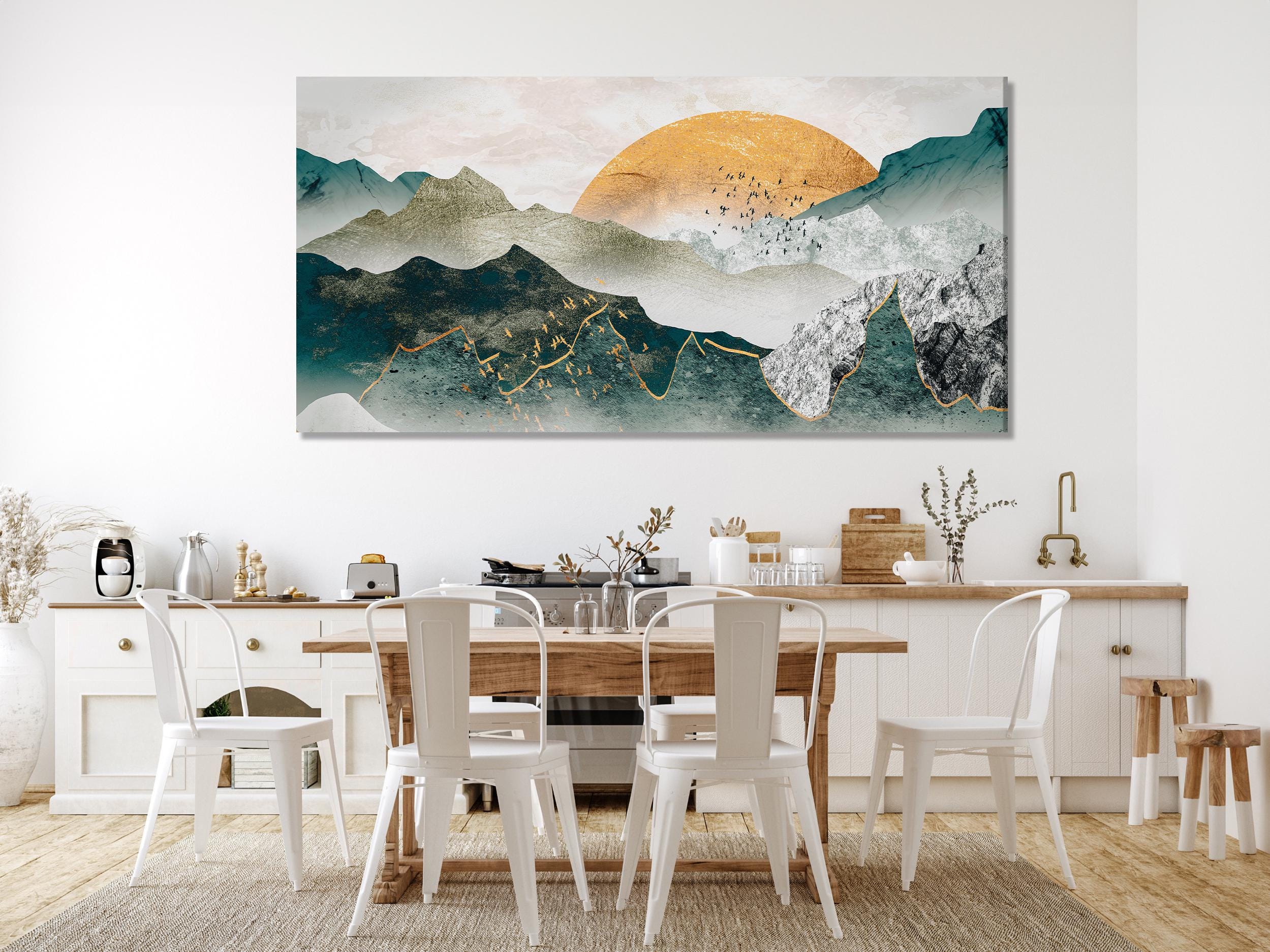 Elegant mountainscape painting combining teal hues, textured highlights, and shimmering gold, forming an eye-catching wall art piece for sophisticated décor.