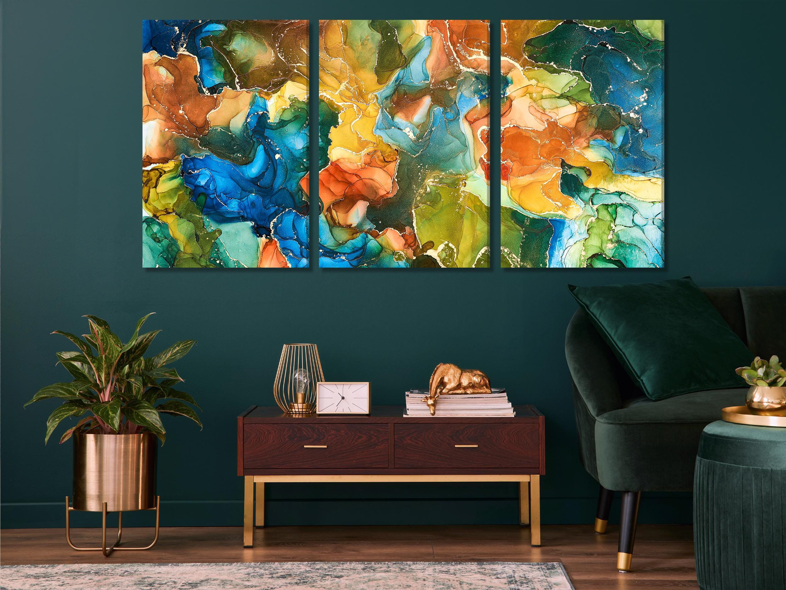 Fluid art canvas shown as a triptych in a modern living room