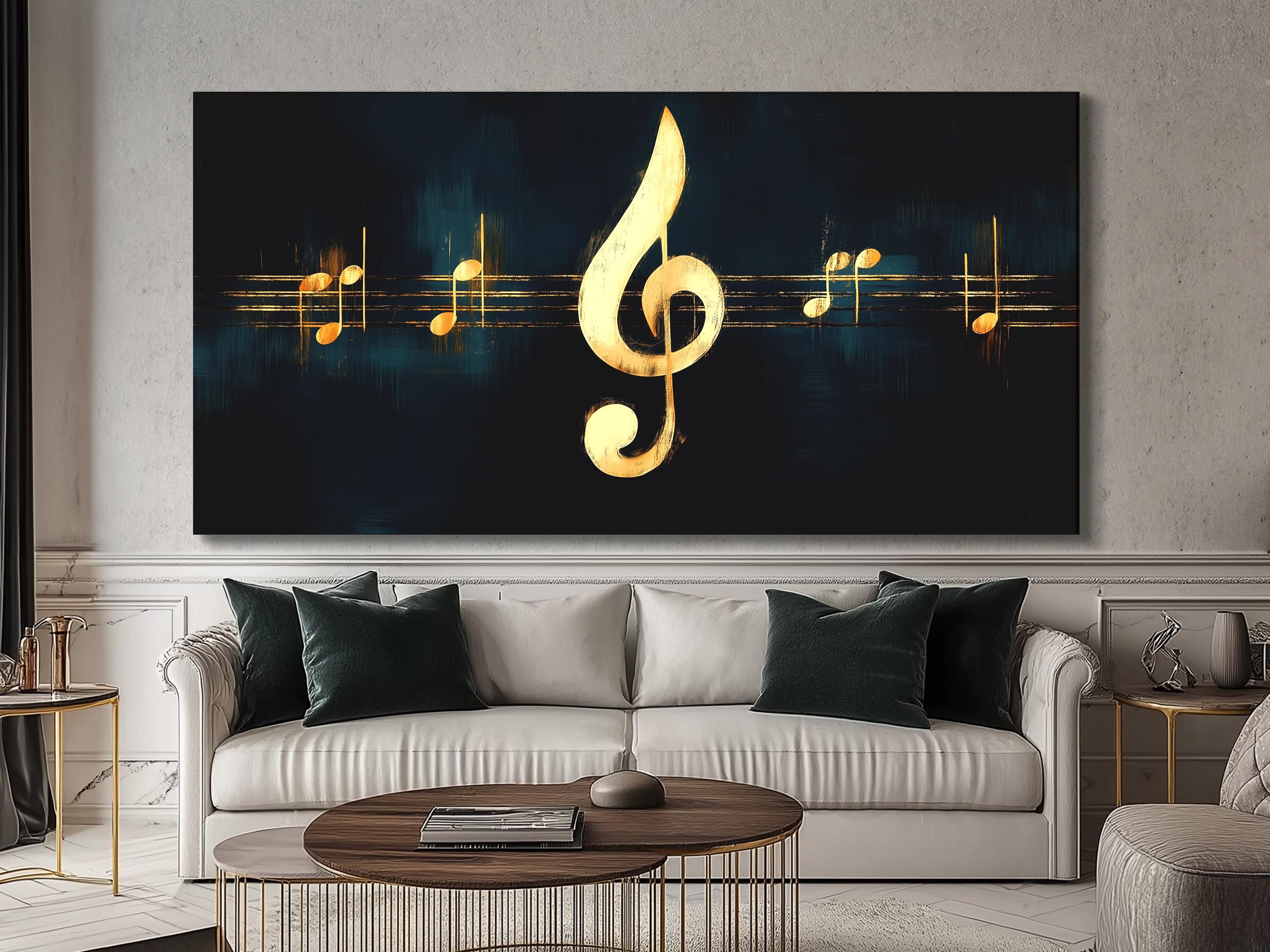 Gold Treble Clef on Black Canvas – Living Room Scale Black and gold treble clef canvas above a white sofa with dark green cushions