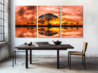 Impression sur toile African Sunset - Silhouette d'arbre murale, paysage du coucher de soleil dans le Serengeti, décoration nature orange vive, grande œuvre murale safari