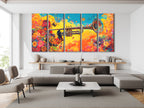 Floral trumpet multi-panel wall art with vibrant colors above a sofa in a modern living room.