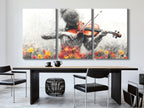 Canvas Art of a grayscale multi-panel violinist with vibrant floral accents, displayed above a dining table in a modern dining room.